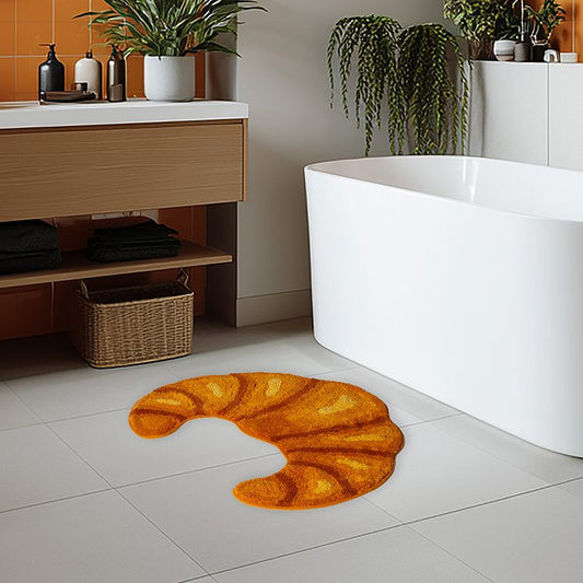 Kikkerland Croissant Bath Rug tappeto da bagno a forma di croissant ambientato