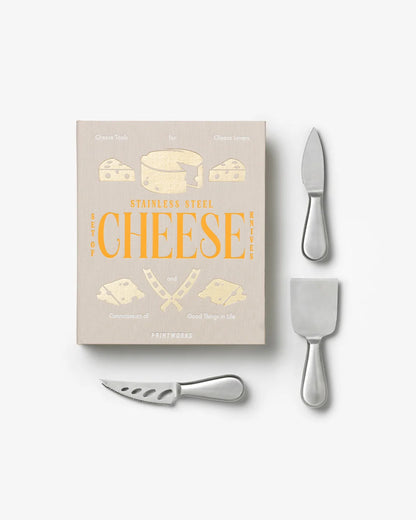 Principale: Printworks The Essentials Cheese Tools con scatola beige e tre coltelli da formaggio in acciaio inox