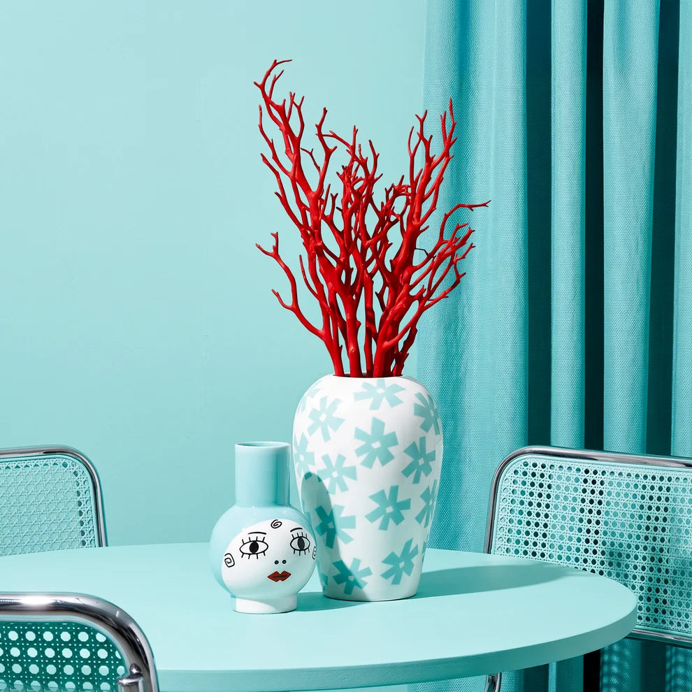 vaso Seletti Canopie Zita ambientato con composizione di rami decorativi